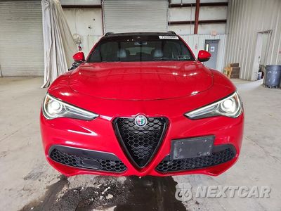 Piąte zdjęcie samochodu w środku: 2021 ALFA ROMEO STELVIO TI VIN:ZASPAKBN9M7D10166 - miniatura