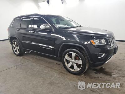 Czwarte zdjęcie samochodu z boku: 2014 JEEP GRAND CHEROKEE LIMITED VIN:1C4RJFBGXEC211407 - miniatura