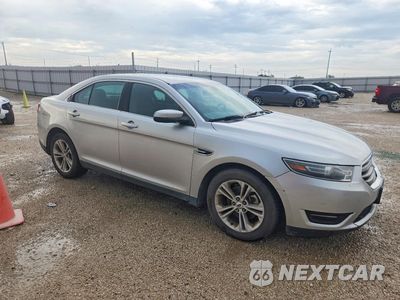 Czwarte zdjęcie samochodu z boku: 2015 FORD TAURUS SEL VIN:1FAHP2E88FG125682 - miniatura