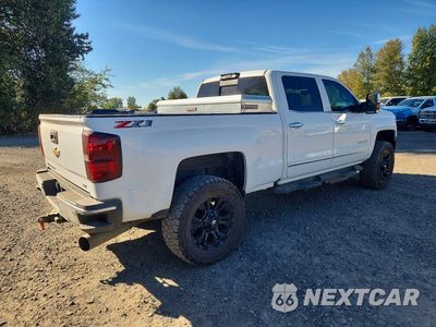 Trzecie zdjęcie samochodu z tyłu: 2019 CHEVROLET SILVERADO K2500 HEAVY DUTY LTZ VIN:1GC1KTEYXKF159560 - miniatura