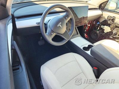Zdjęcie 8 z 14 samochodu: 2024 TESLA MODEL Y VIN:7SAYGDEE9RF063190 - miniatura