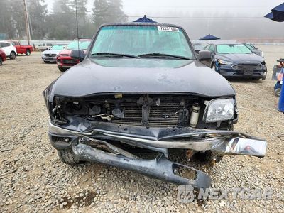 Piąte zdjęcie samochodu w środku: 2004 TOYOTA TACOMA BASE VIN:5TEVL52N34Z313858 - miniatura