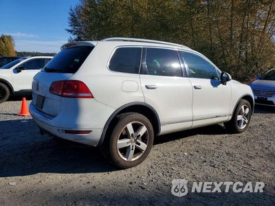 Trzecie zdjęcie samochodu z tyłu: 2014 VOLKSWAGEN TOUAREG V6 TDI VIN:WVGEP9BP0ED010281 - miniatura