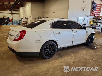 Trzecie zdjęcie samochodu z tyłu: 2015 LINCOLN MKS VIN:1LNHL9FT8FG600759 - miniatura