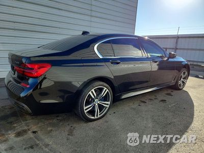 Trzecie zdjęcie samochodu z tyłu: 2017 BMW 740 I VIN:WBA7E2C58HG739216 - miniatura