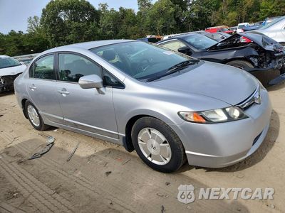 Czwarte zdjęcie samochodu z boku: 2007 HONDA CIVIC HYBRID VIN:JHMFA36247S005118 - miniatura