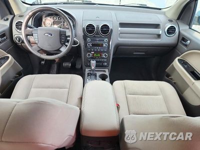 Zdjęcie 8 z 13 samochodu: 2008 FORD TAURUS X SEL VIN:1FMDK02W88GA14045 - miniatura