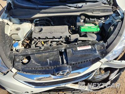 Zdjęcie 11 z 12 samochodu: 2011 HYUNDAI TUCSON LIMITED VIN:KM8JUCAC2BU292101 - miniatura