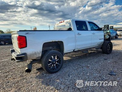 Trzecie zdjęcie samochodu z tyłu: 2016 CHEVROLET SILVERADO K2500 HEAVY DUTY LT VIN:1GC1KVE8XGF223129 - miniatura