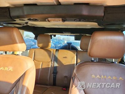 Zdjęcie 10 z 13 samochodu: 2014 JEEP WRANGLER UNLIMITED SAHARA VIN:1C4BJWEG5EL110854 - miniatura