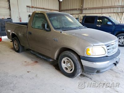 Czwarte zdjęcie samochodu z boku: 2003 FORD F150 VIN:1FTRF17223NA23645 - miniatura