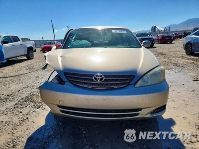 Piąte zdjęcie samochodu w środku: 2004 TOYOTA CAMRY LE VIN:JTDBE32K240301529 - miniatura