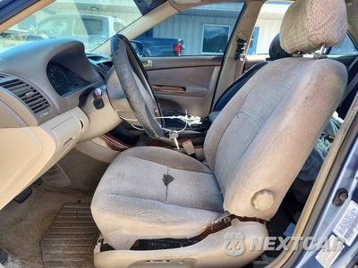 Zdjęcie 7 z 12 samochodu: 2002 TOYOTA CAMRY LE VIN:4T1BE32K12U595748 - miniatura