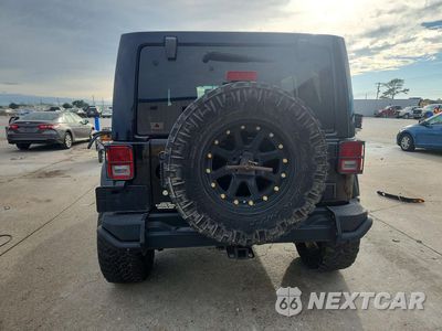 Zdjęcie 6 z 13 samochodu: 2013 JEEP WRANGLER UNLIMITED SAHARA VIN:1C4HJWEG5DL580603 - miniatura