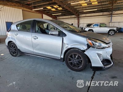 Czwarte zdjęcie samochodu z boku: 2017 TOYOTA PRIUS C ONE VIN:JTDKDTB33H1592697 - miniatura