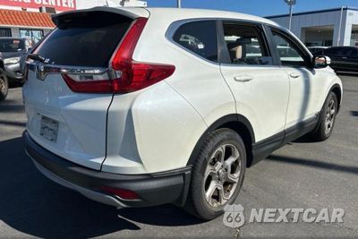 Czwarte zdjęcie samochodu z boku: 2017 HONDA CR-V EXL VIN:2HKRW1H87HH501892 - miniatura