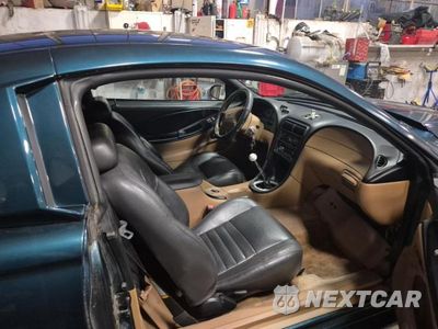 Piąte zdjęcie samochodu w środku: 1995 FORD MUSTANG GT VIN:1FALP42T9SF136253 - miniatura