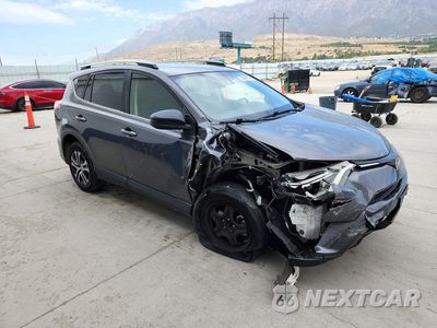 Czwarte zdjęcie samochodu z boku: 2017 TOYOTA RAV4 LE VIN:JTMBFREV7HJ156820 - miniatura