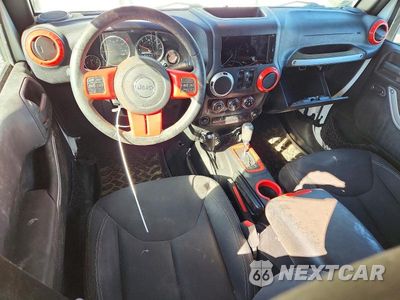 Zdjęcie 8 z 12 samochodu: 2016 JEEP WRANGLER UNLIMITED SAHARA VIN:1C4BJWEG0GL103765 - miniatura