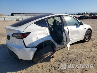 Trzecie zdjęcie samochodu z tyłu: 2023 TESLA MODEL Y VIN:7SAYGAEE1PF740194 - miniatura