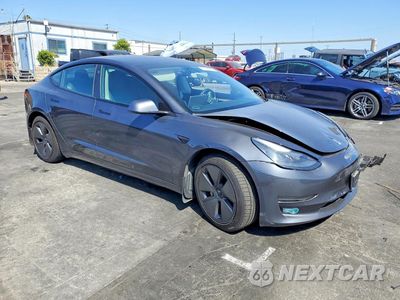 Czwarte zdjęcie samochodu z boku: 2021 TESLA MODEL 3 VIN:5YJ3E1EA4MF994732 - miniatura