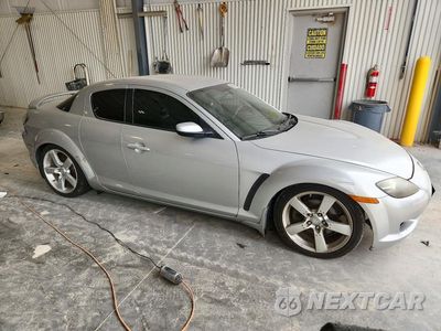 Czwarte zdjęcie samochodu z boku: 2004 MAZDA RX8 VIN:JM1FE173X40140015 - miniatura