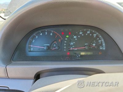Zdjęcie 9 z 12 samochodu: 2004 TOYOTA CAMRY LE VIN:JTDBE32K340255273 - miniatura