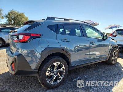 Trzecie zdjęcie samochodu z tyłu: 2024 SUBARU CROSSTREK PREMIUM VIN:JF2GUADC2R8914621 - miniatura