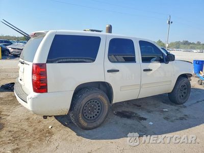 Trzecie zdjęcie samochodu z tyłu: 2012 CHEVROLET TAHOE POLICE VIN:1GNLC2E0XCR188591 - miniatura