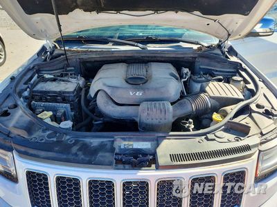 Zdjęcie 12 z 13 samochodu: 2014 JEEP GRAND CHEROKEE OVERLAND VIN:1C4RJFCGXEC498620 - miniatura