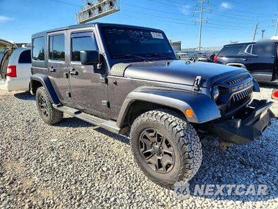 Czwarte zdjęcie samochodu z boku: 2016 JEEP WRANGLER UNLIMITED SAHARA VIN:1C4BJWEG3GL153074 - miniatura