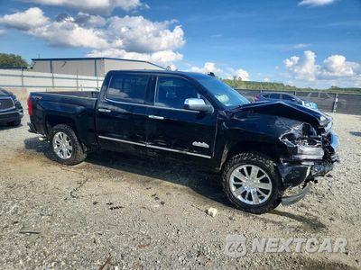 Czwarte zdjęcie samochodu z boku: 2017 CHEVROLET SILVERADO K1500 HIGH COUNTRY VIN:3GCUKTEJ8HG198770 - miniatura