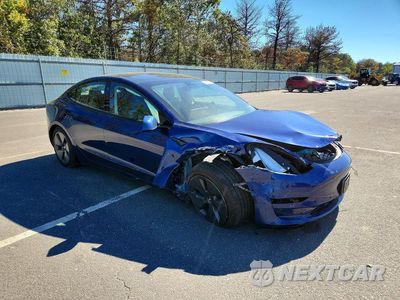 Czwarte zdjęcie samochodu z boku: 2021 TESLA MODEL 3 VIN:5YJ3E1EB4MF869173 - miniatura