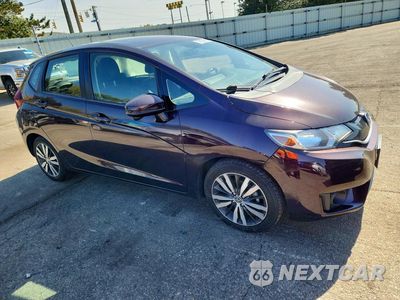 Czwarte zdjęcie samochodu z boku: 2016 HONDA FIT EX VIN:3HGGK5H73GM704886 - miniatura