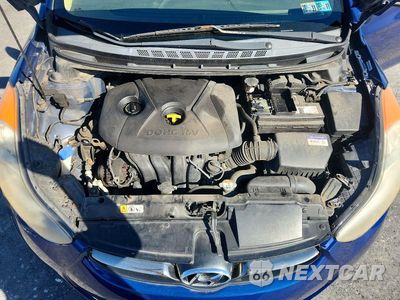 Zdjęcie 11 z 12 samochodu: 2013 HYUNDAI ELANTRA LIMITED VIN:KMHDH4AE5DU523536 - miniatura