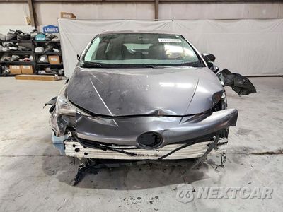 Piąte zdjęcie samochodu w środku: 2016 TOYOTA PRIUS TWO VIN:JTDKBRFU5G3003003 - miniatura