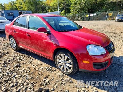 Czwarte zdjęcie samochodu z boku: 2010 VOLKSWAGEN JETTA WOLFSBURG VIN:3VWRA7AJ6AM053558 - miniatura
