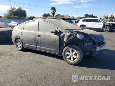Czwarte zdjęcie samochodu z boku: 2005 TOYOTA PRIUS BASE VIN:JTDKB20UX53006556 - miniatura