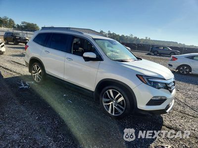 Czwarte zdjęcie samochodu z boku: 2017 HONDA PILOT TOURING VIN:5FNYF5H99HB017264 - miniatura