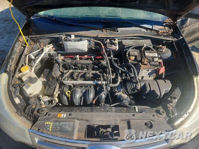 Zdjęcie 11 z 12 samochodu: 2008 FORD FOCUS S/SE VIN:1FAHP32N88W238363 - miniatura