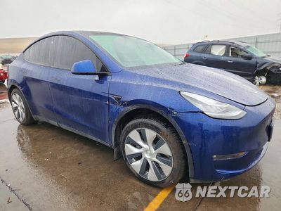 Czwarte zdjęcie samochodu z boku: 2022 TESLA MODEL Y VIN:7SAYGDEE8NF323332 - miniatura