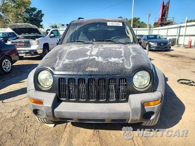 Piąte zdjęcie samochodu w środku: 2002 JEEP LIBERTY SPORT VIN:1J4GL48K62W136730 - miniatura