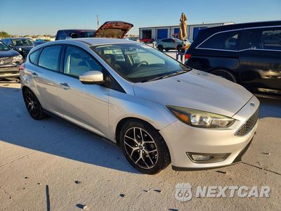 Czwarte zdjęcie samochodu z boku: 2017 FORD FOCUS SEL VIN:1FADP3M27HL276542 - miniatura