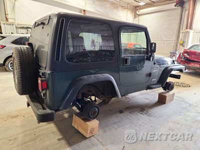 Trzecie zdjęcie samochodu z tyłu: 2000 JEEP WRANGLER / TJ SPORT VIN:1J4FA49S3YP755062 - miniatura