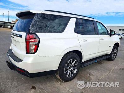 Trzecie zdjęcie samochodu z tyłu: 2024 CHEVROLET TAHOE K1500 Z71 VIN:1GNSKPKD3RR328105 - miniatura