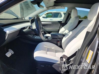 Zdjęcie 7 z 12 samochodu: 2024 TESLA MODEL Y VIN:7SAYGDEF5RA303521 - miniatura