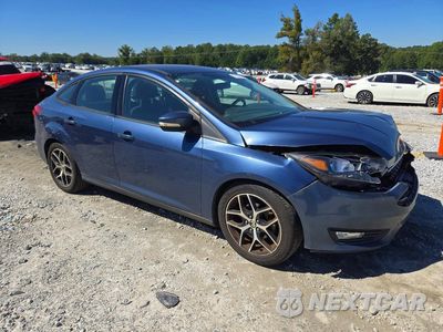 Czwarte zdjęcie samochodu z boku: 2018 FORD FOCUS SEL VIN:1FADP3H20JL309607 - miniatura