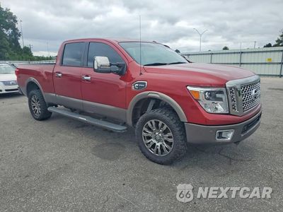 Czwarte zdjęcie samochodu z boku: 2016 NISSAN TITAN XD PLATINUM RESERVE VIN:1N6BA1F40GN506184 - miniatura