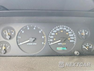 Zdjęcie 9 z 13 samochodu: 1999 JEEP GRAND CHEROKEE LAREDO VIN:1J4GW58S1XC680154 - miniatura