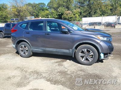 Czwarte zdjęcie samochodu z boku: 2017 HONDA CR-V LX VIN:2HKRW6H38HH211002 - miniatura